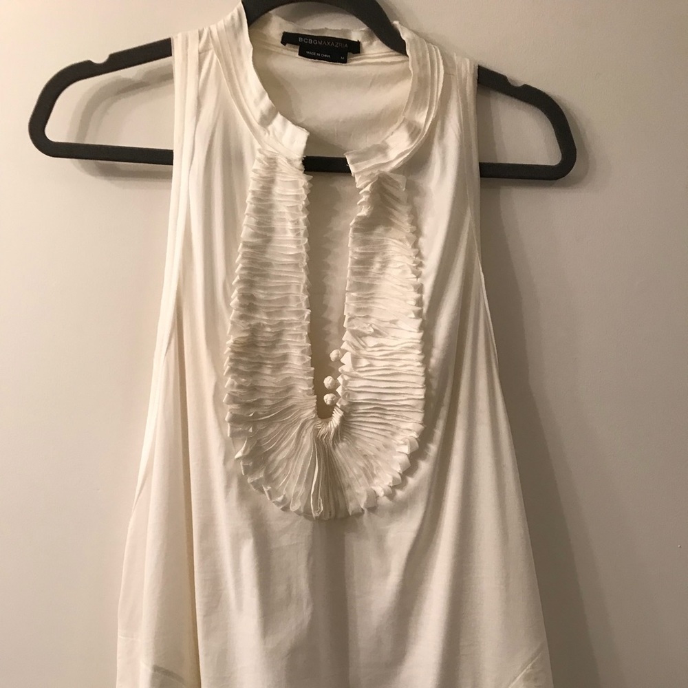 BCBG white tunic top with pockets.